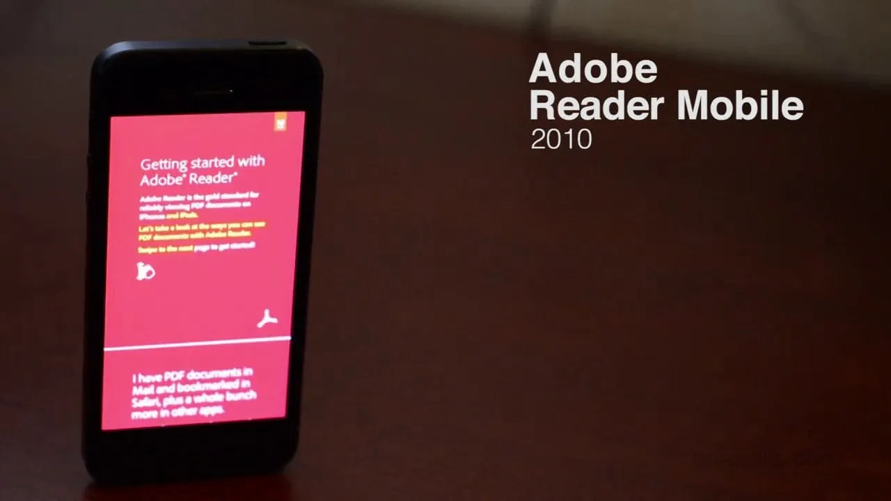 Title frame of the Adobe Reader Mobile demo video, with a phone standing on a table showing a red Getting started screen beside the product name.